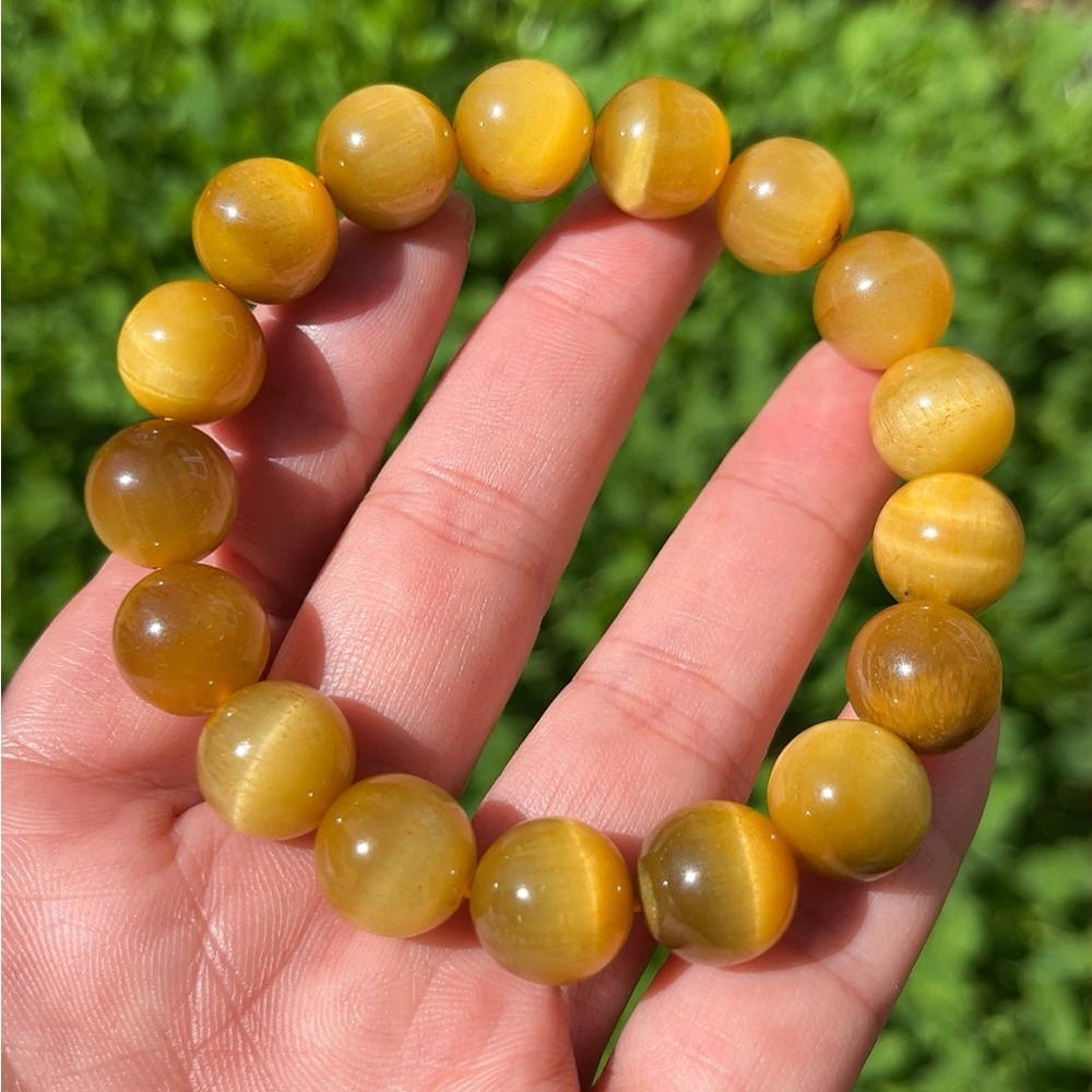 12mm gorgeous golden flashy‎ tiger eye bracelet